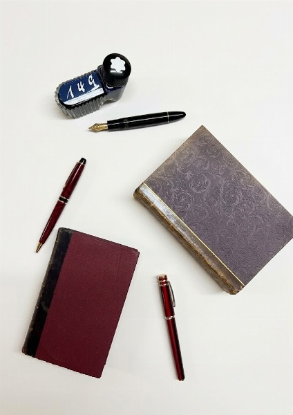 Pens. Book and Print